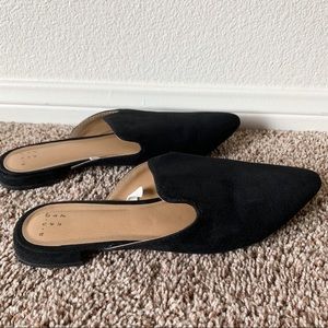 Black pointed toe open heel flat slide mule